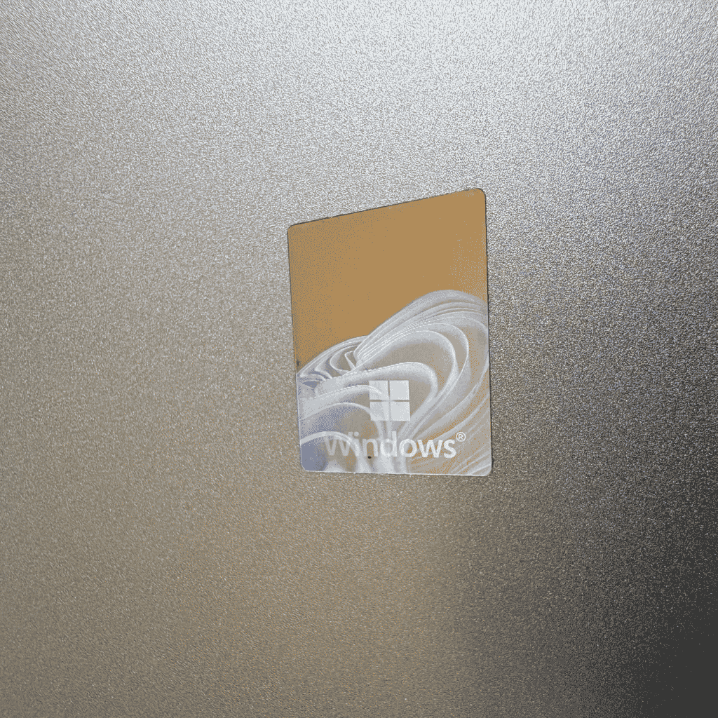 PNS-ELITEBOOK840G8-0717266 - ATR Store Windows product key card with the Windows logo on a textured metallic surface on a speckled backdrop.